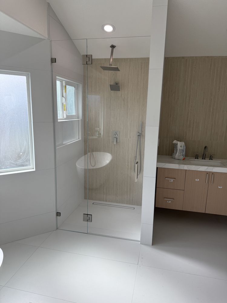 Frameless glass shower door installed by Crockett Rodeo Glass