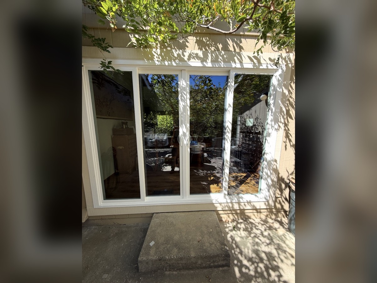 New white vinyl sliding patio door