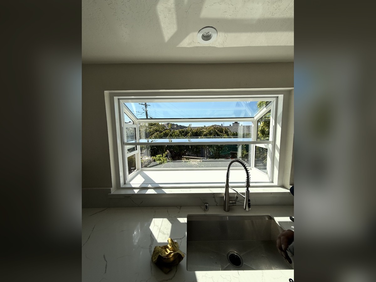 Garden window installed above a kitchen sink