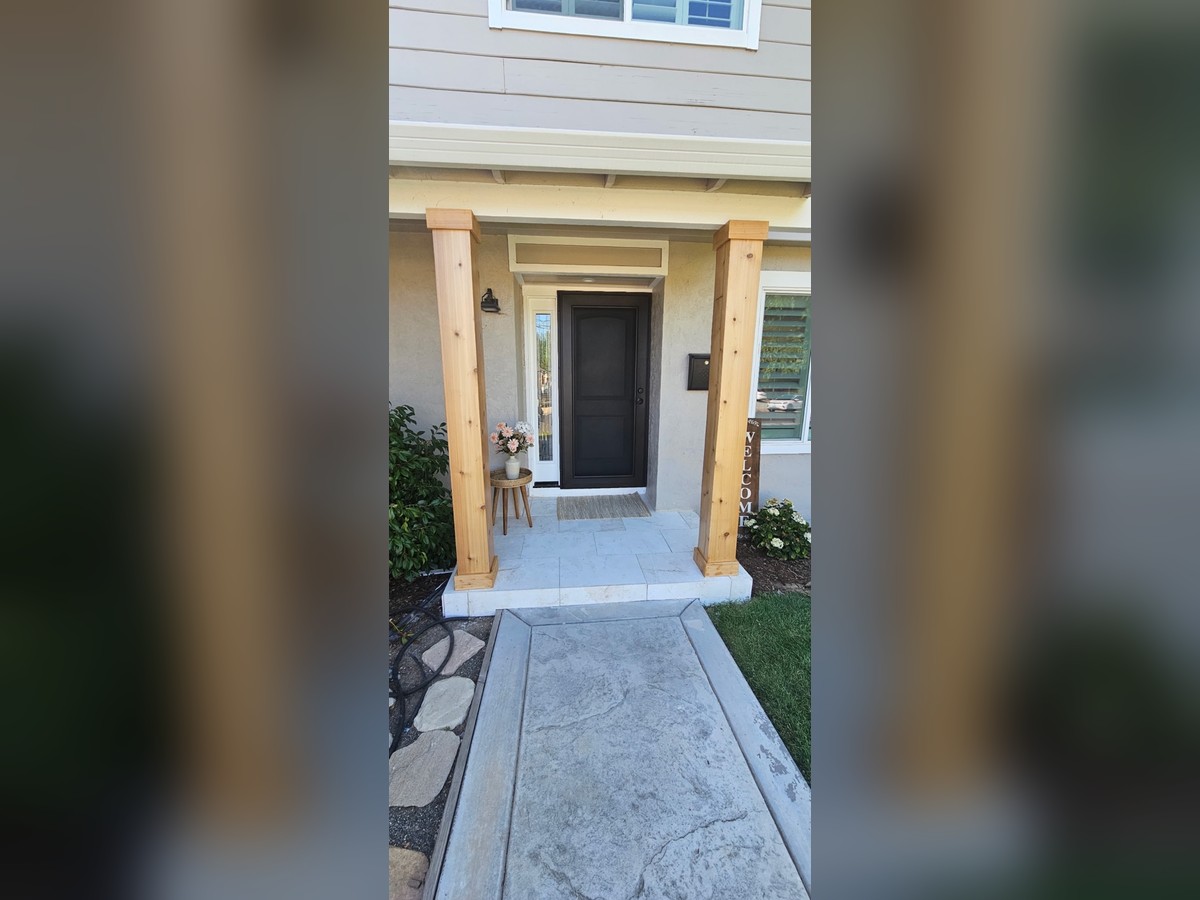 Front entry door with decorative glass sidelite