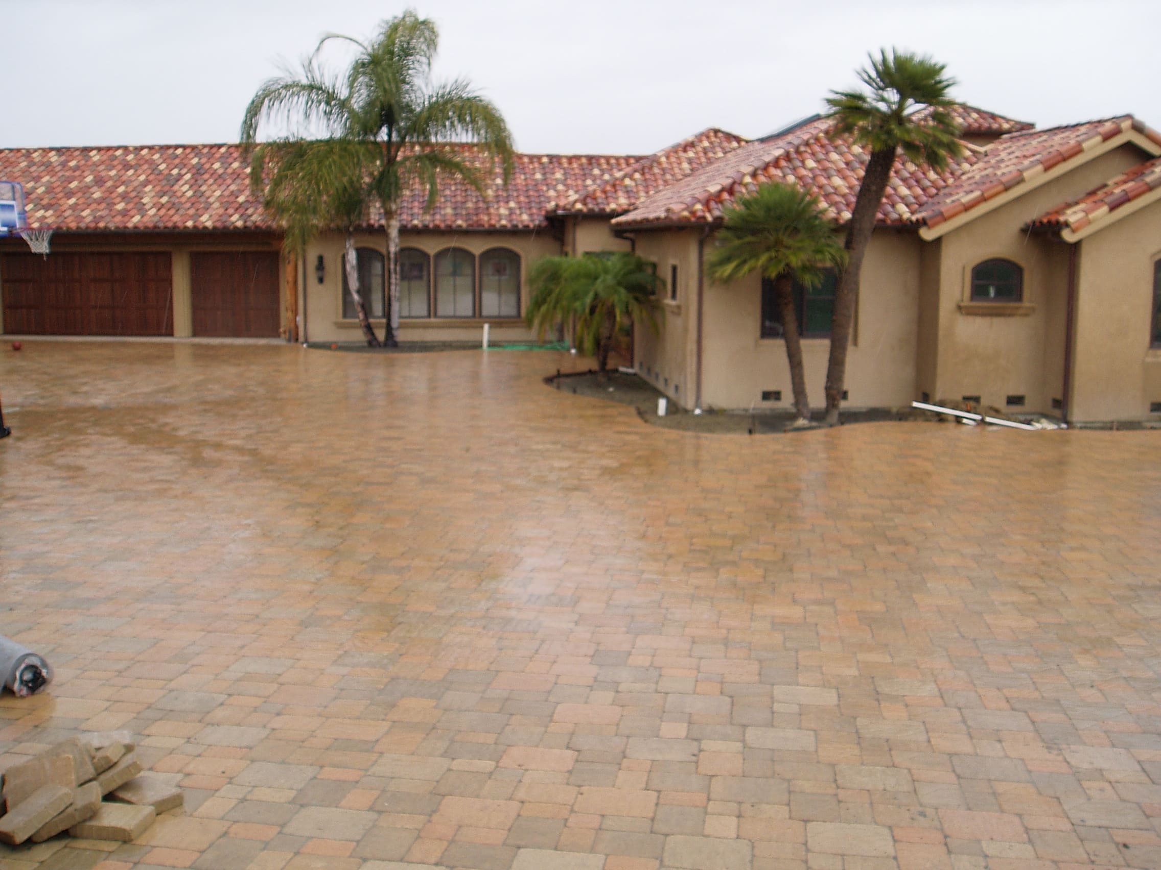 Paver walkway and garden path with landscape lighting - hardscape project from Paradise Building Materials