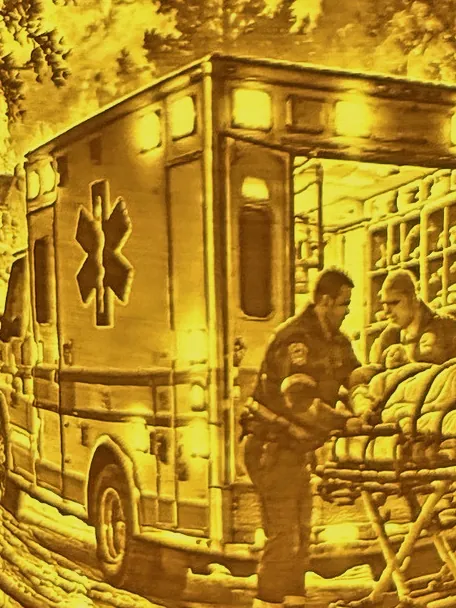 Close-up of the lit Fully Involved shade: ambulance crew