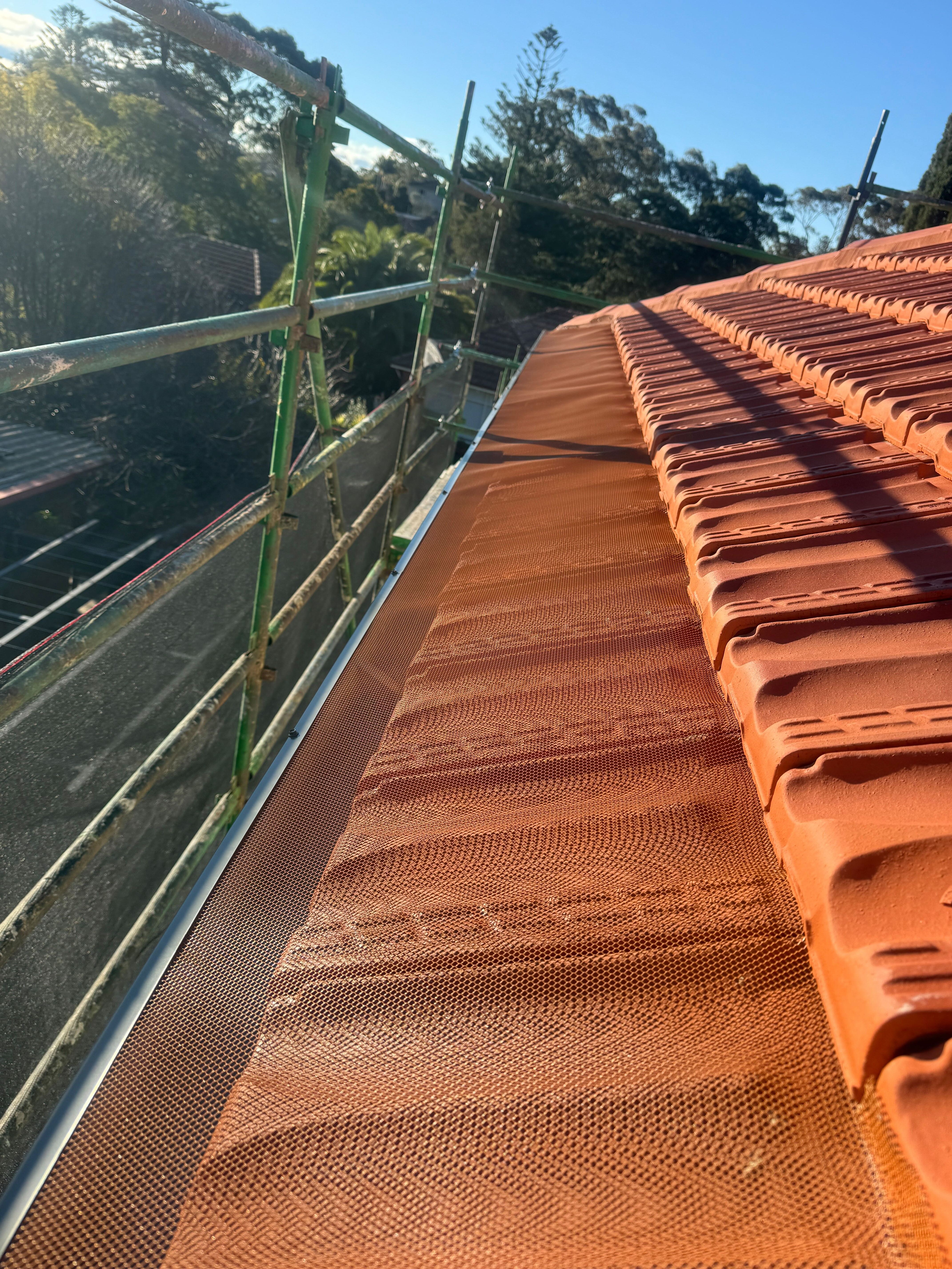 Terracotta Colorbond Roof Gutter Guard Installation