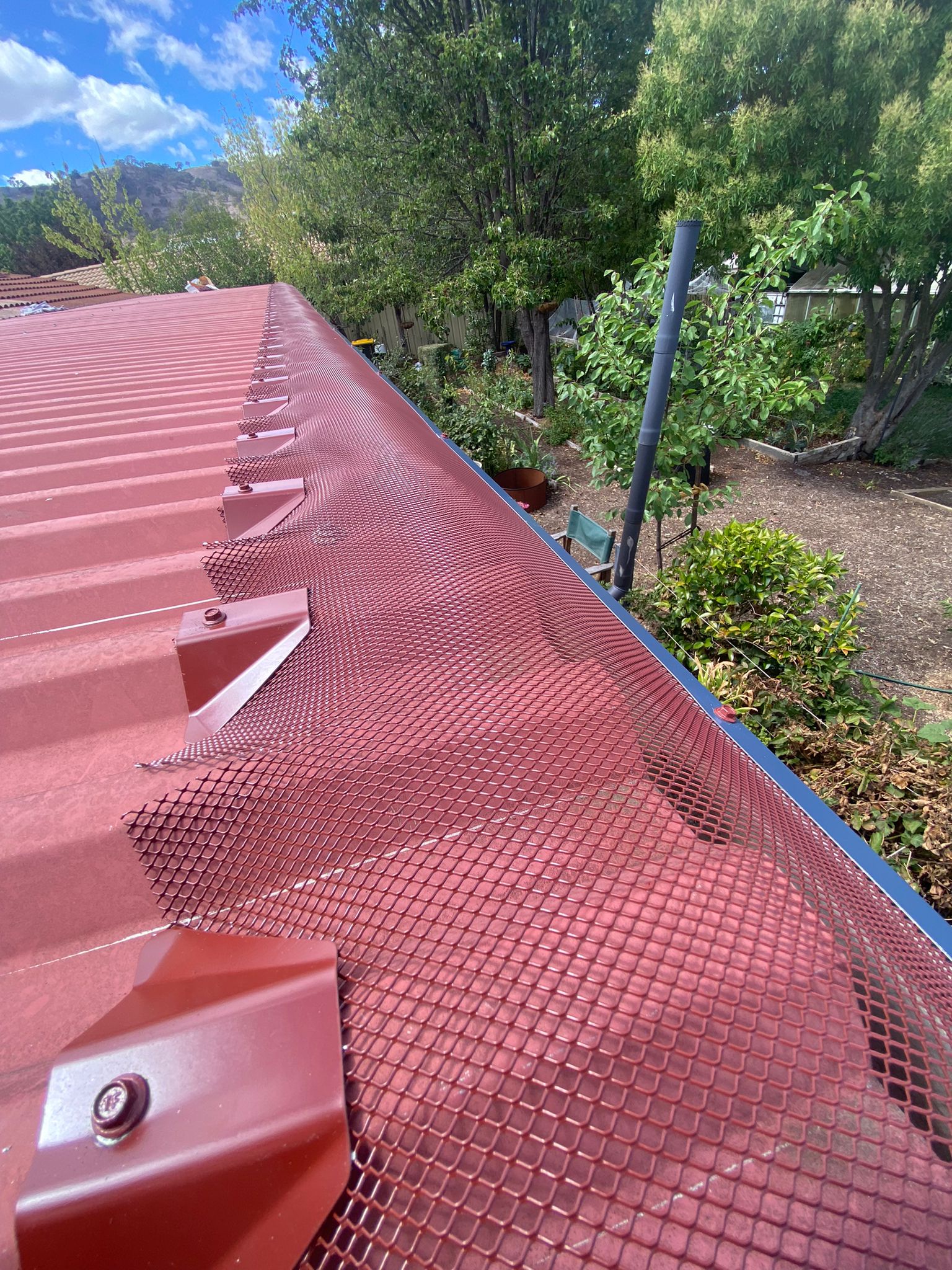 Manor Red Colorbond Roof Gutter Guard Installation