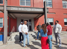 Attendees outside 2900 Welton Street on opening day