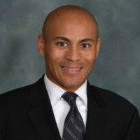 Dr. Kevin Roots, Board Member