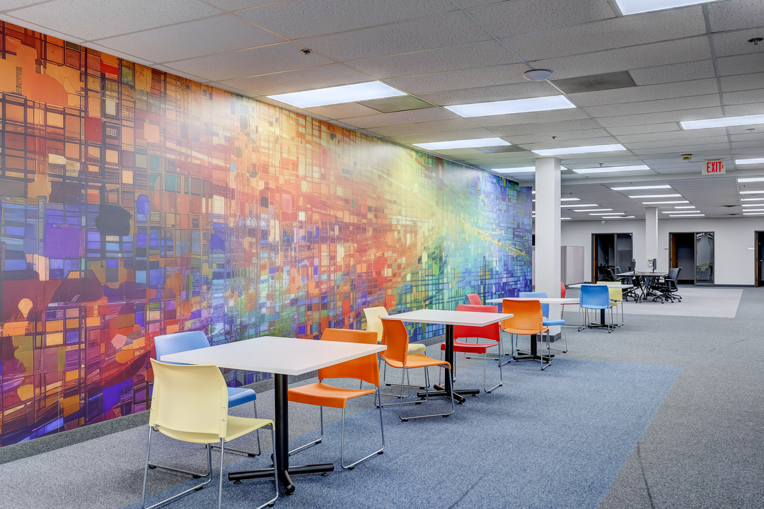 Collaborative coworking zone beside the mural wall