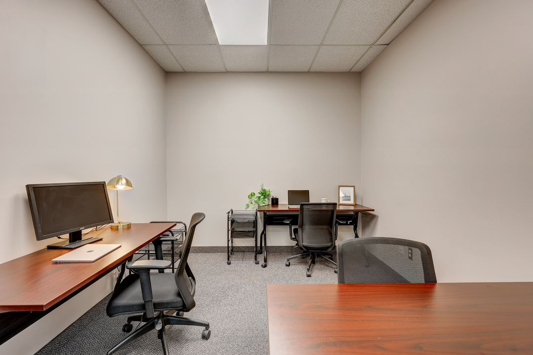 Dedicated desk setup with personal workspace