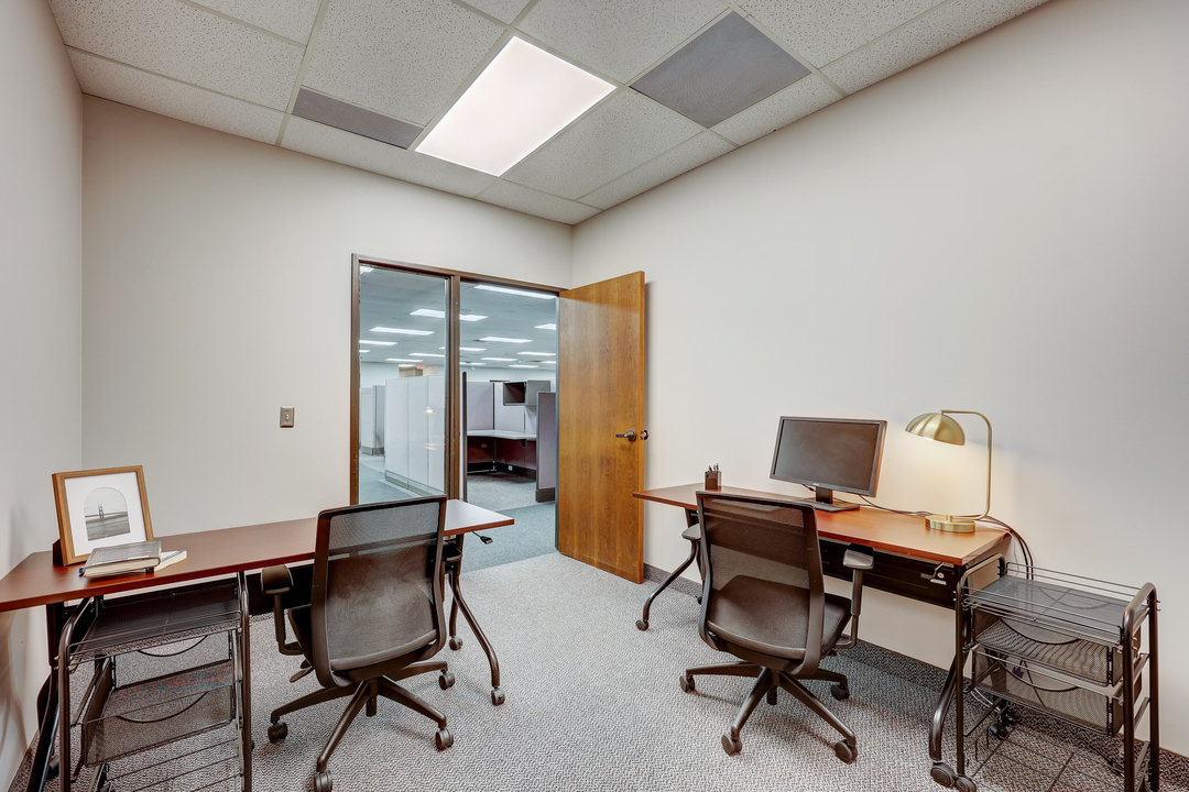 Small team workspace with multiple desks