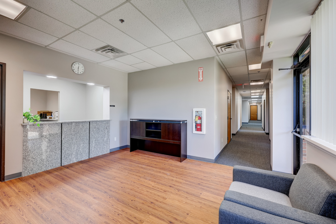 Professional lobby and corridor leading through the suite