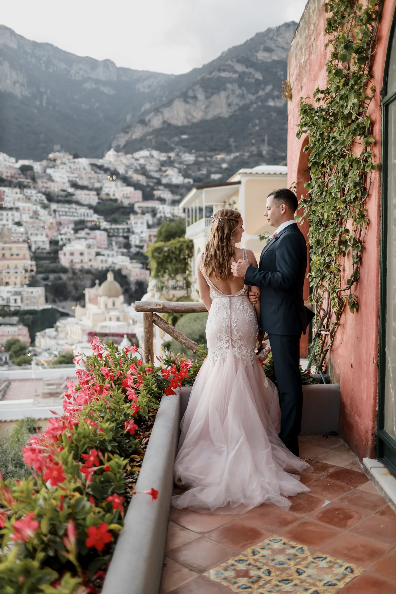 Wedding ceremony on a terrace above the sea on the Amalfi Coast, with Positano in the distance