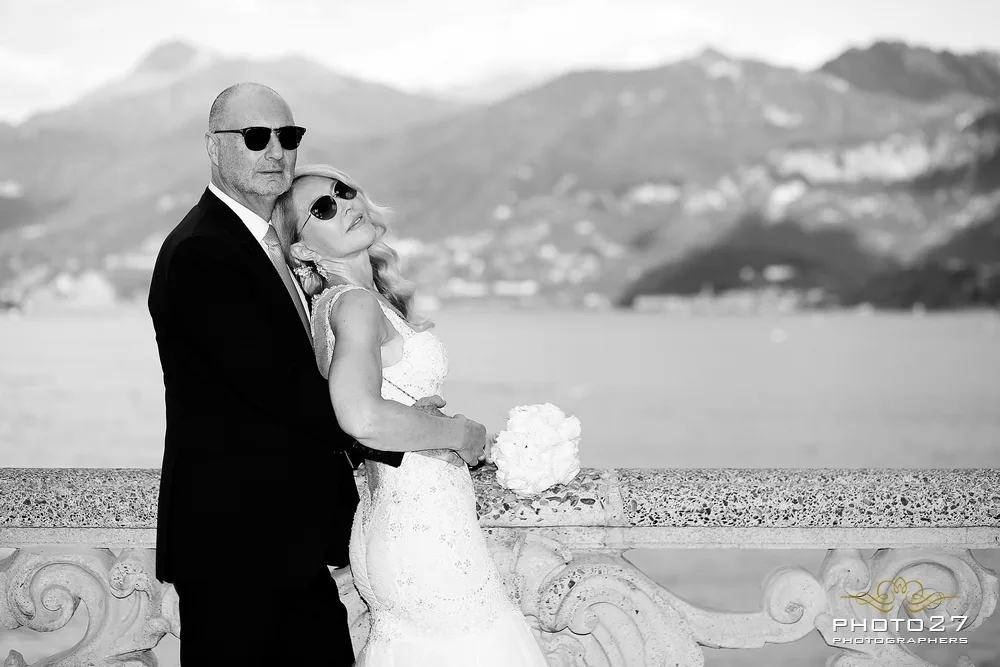 A historic villa terrace on Lake Como set for an intimate ceremony, with the lake and mountains behind