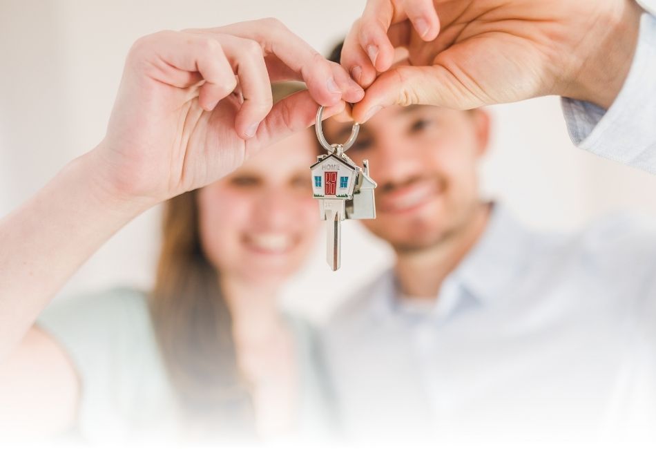 New homeowner family celebrating moving into their new home