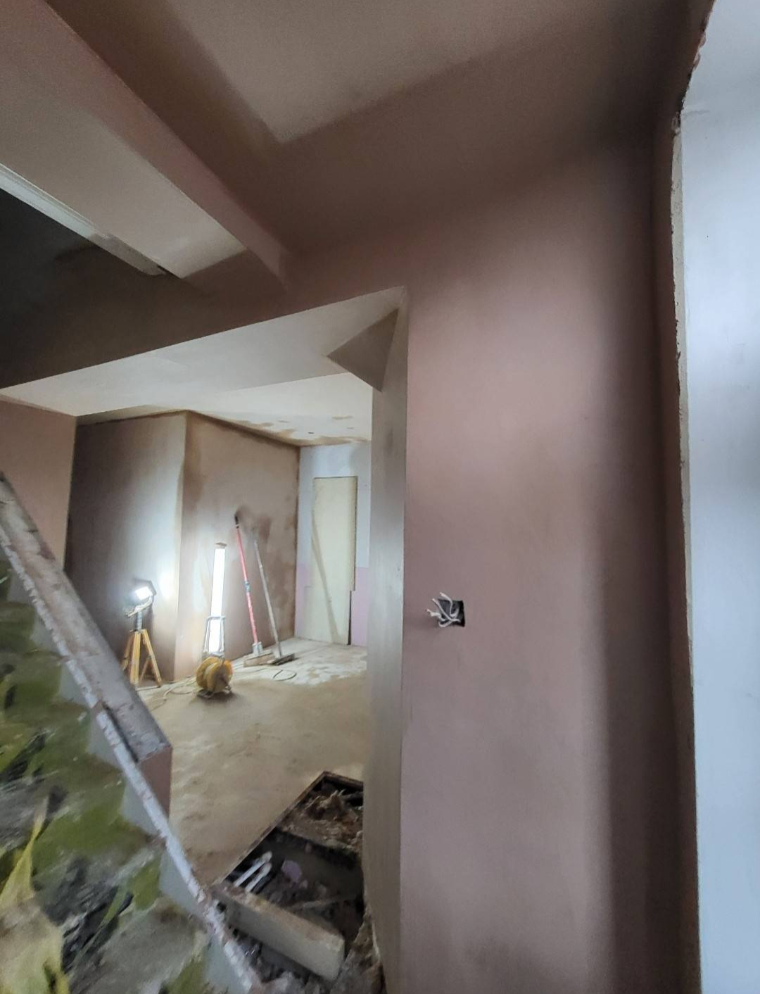 Plastered internal opening repaired and finished to blend in