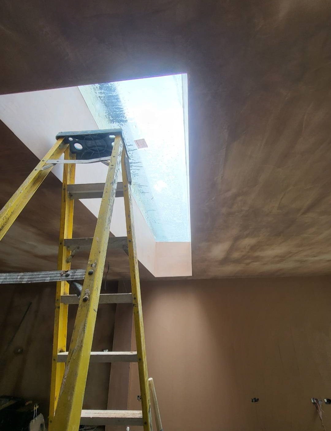 A plastered ceiling with a smooth finish
