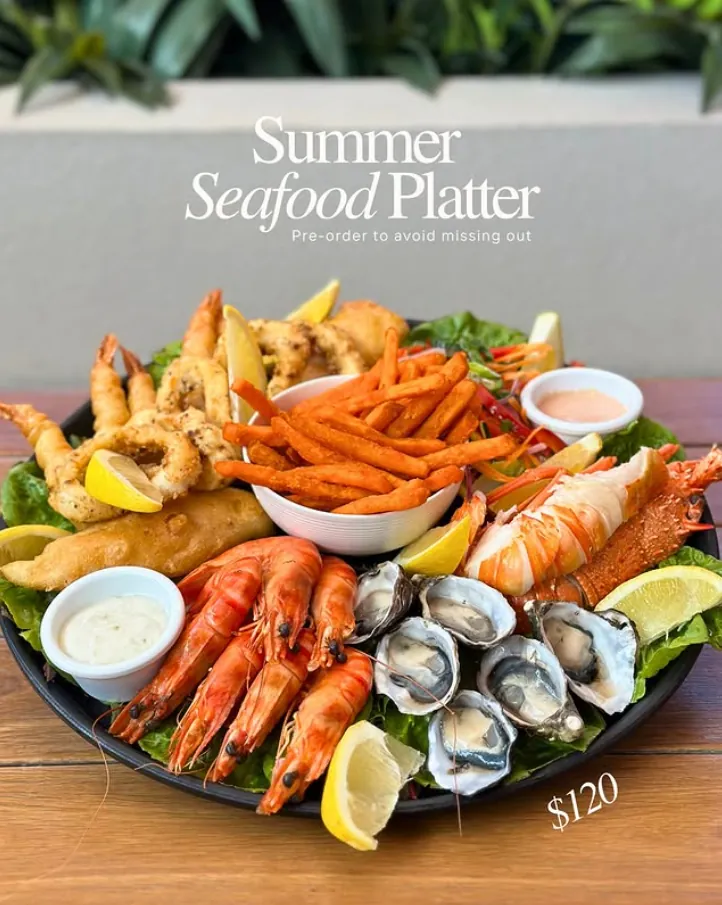 The Cally summer seafood platter with prawns, oysters, lobster and sweet potato wedges
