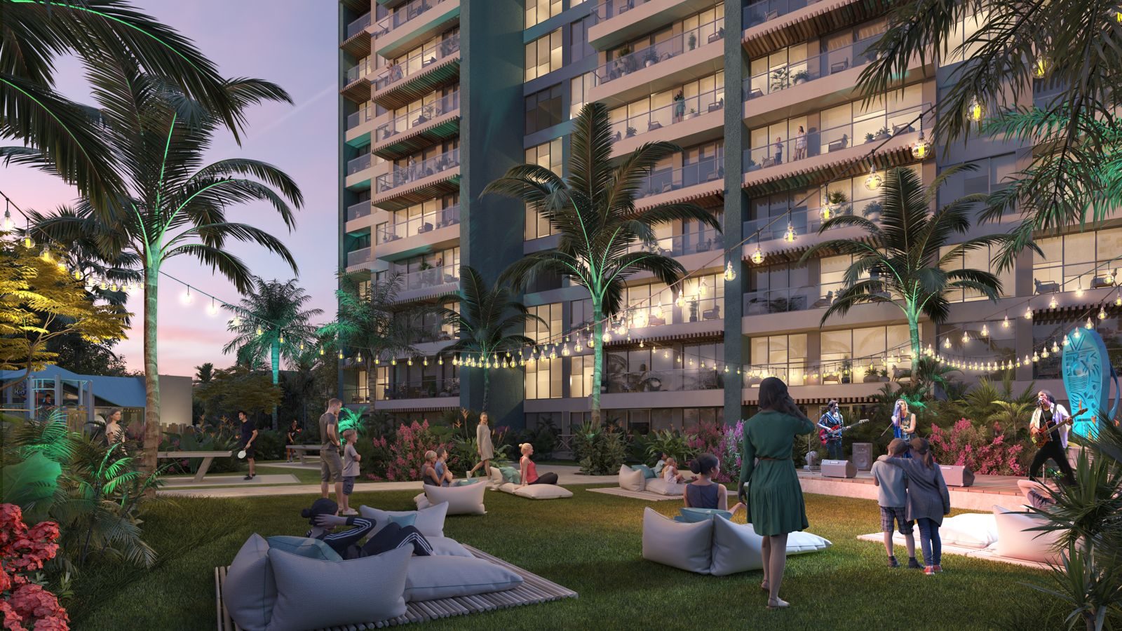 Twilight social lawn between the residential towers at Margaritaville Beach Resort & Residences Playa Caracol