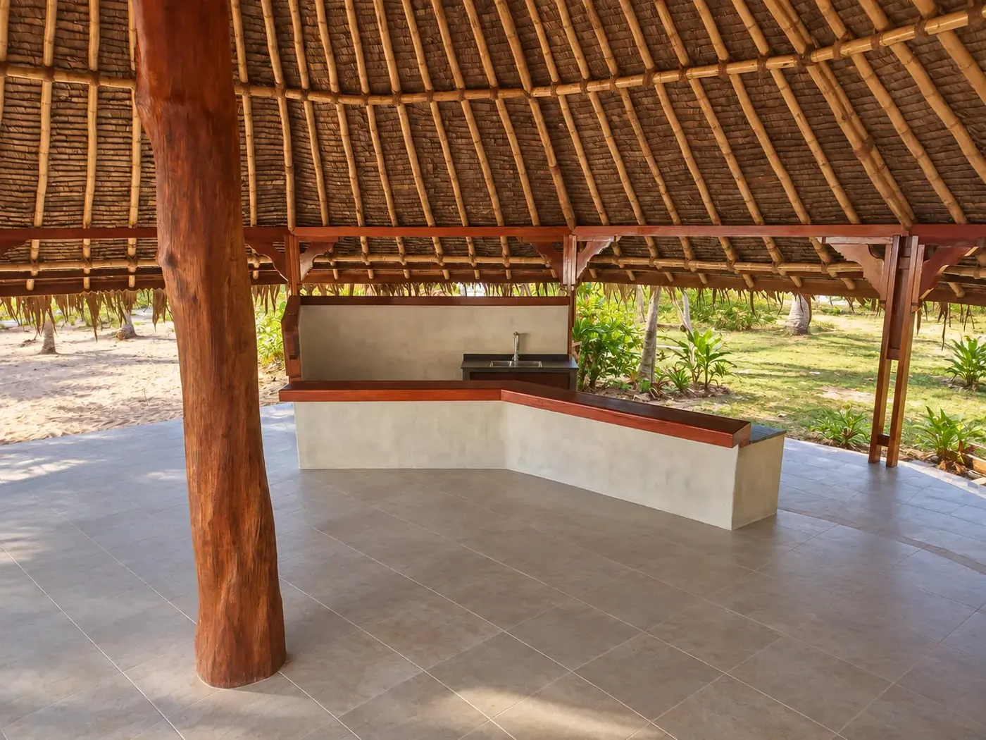 Open interior of the gazebo with a timber bar and central post