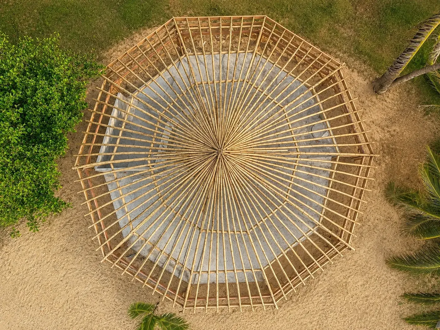 Circular handcrafted gazebo structure photographed from above