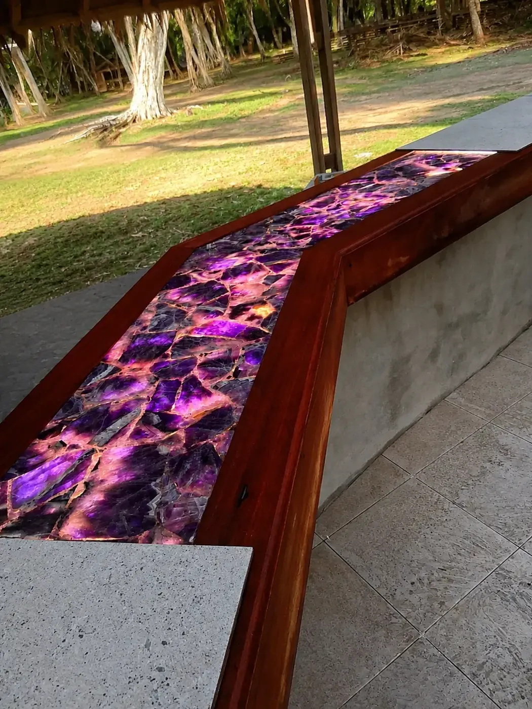 Illuminated Italian amethyst set into the Santos mahogany beachfront bar at Los Caletones