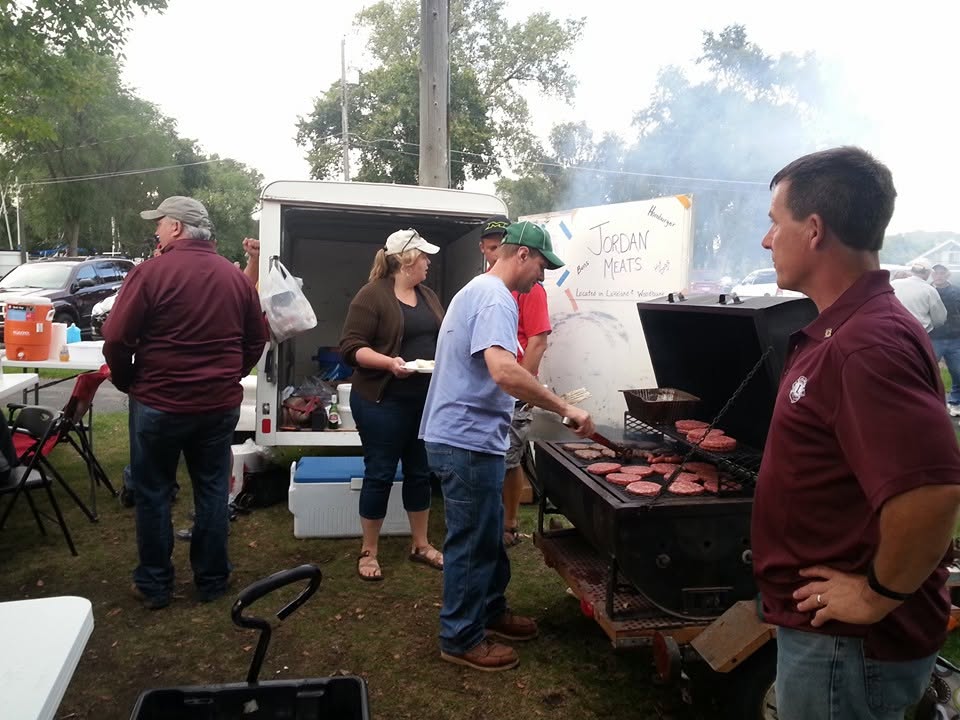 The Jordan Meats crew grilling at a catered event
