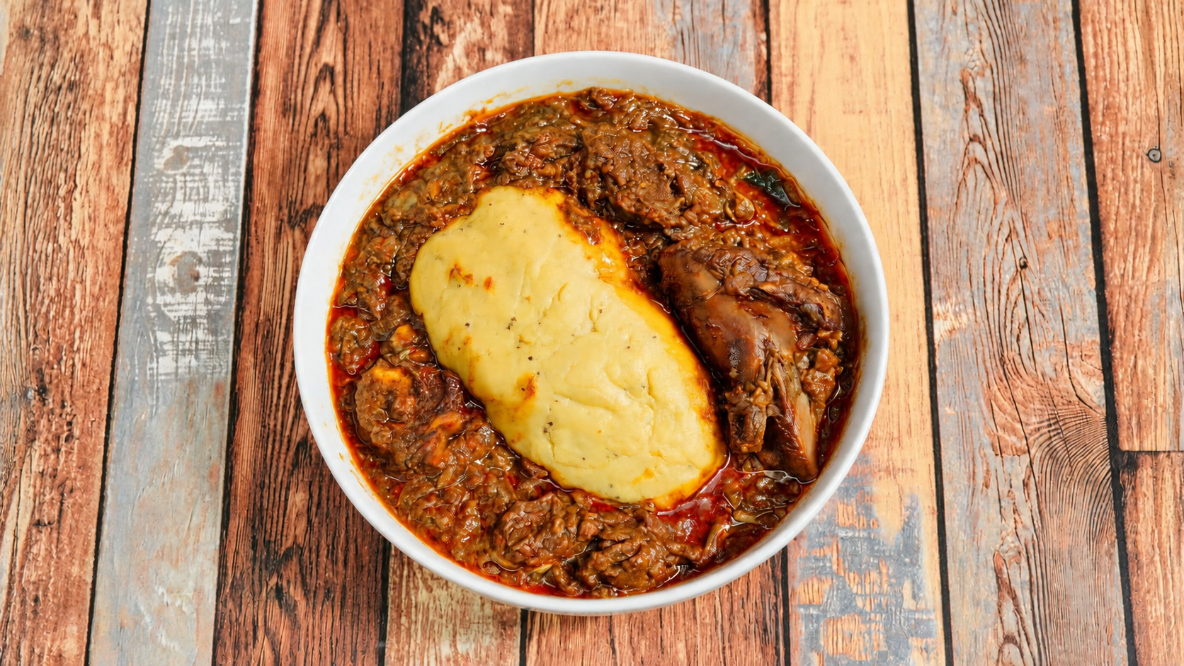 Foutou Sauce Graine — plat africain authentique au restaurant Petite Afrique à Montréal