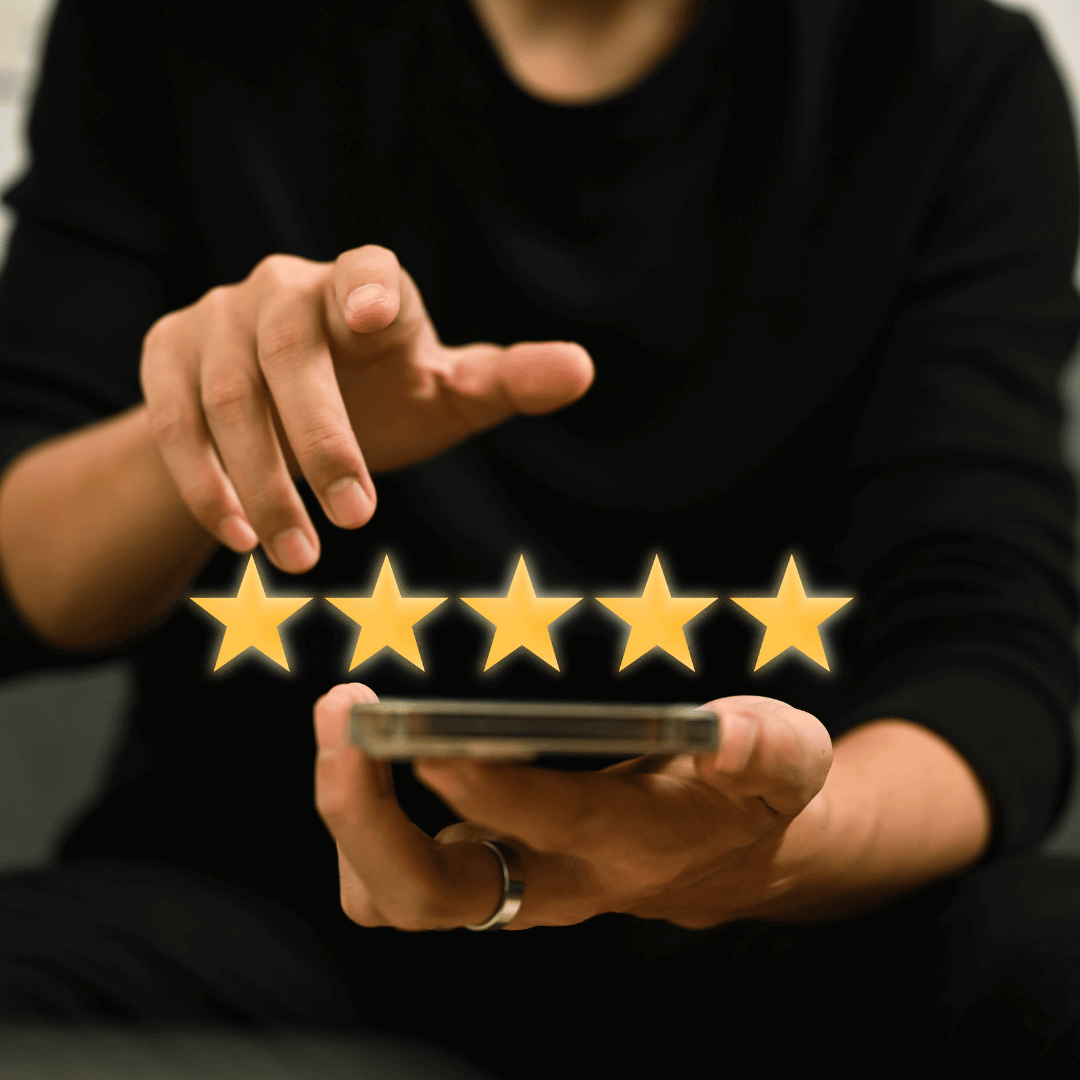 A person about to tap on their iphone with a graphic of 5 stars overlayed on top.