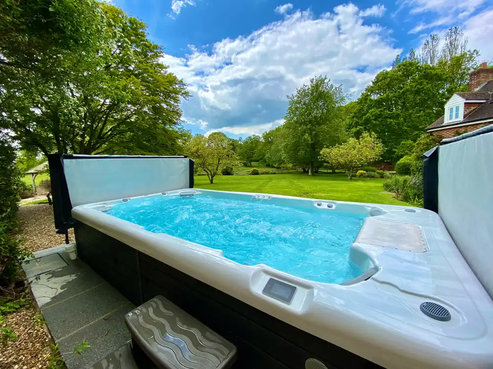 Hot Tubs vs Swim Spas: Cost & Investment Guide
