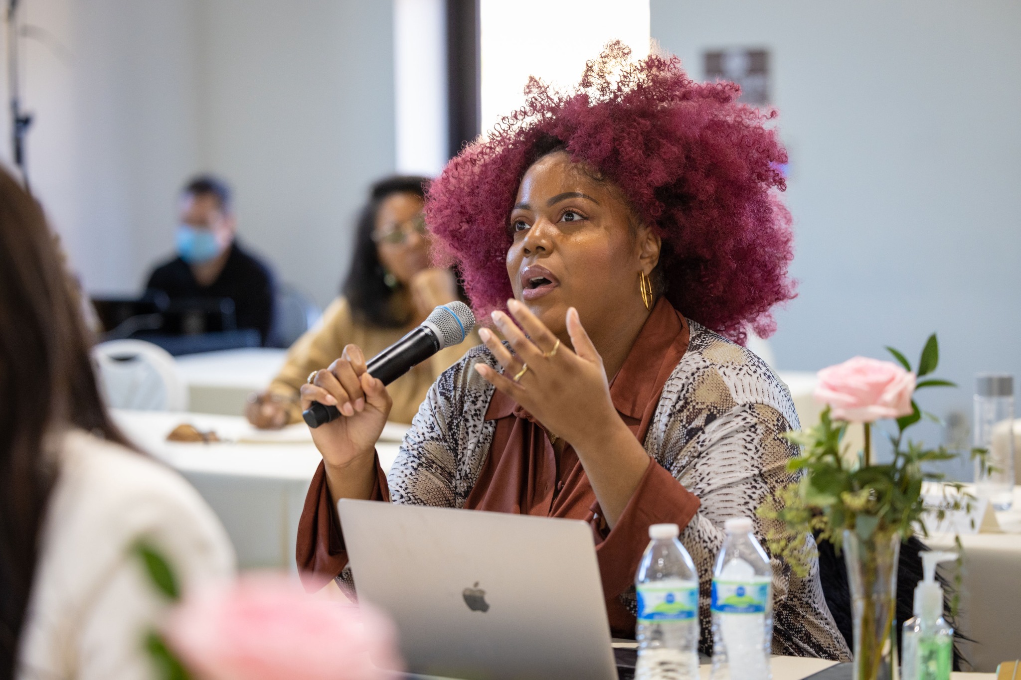 A client contributing to a workshop discussion