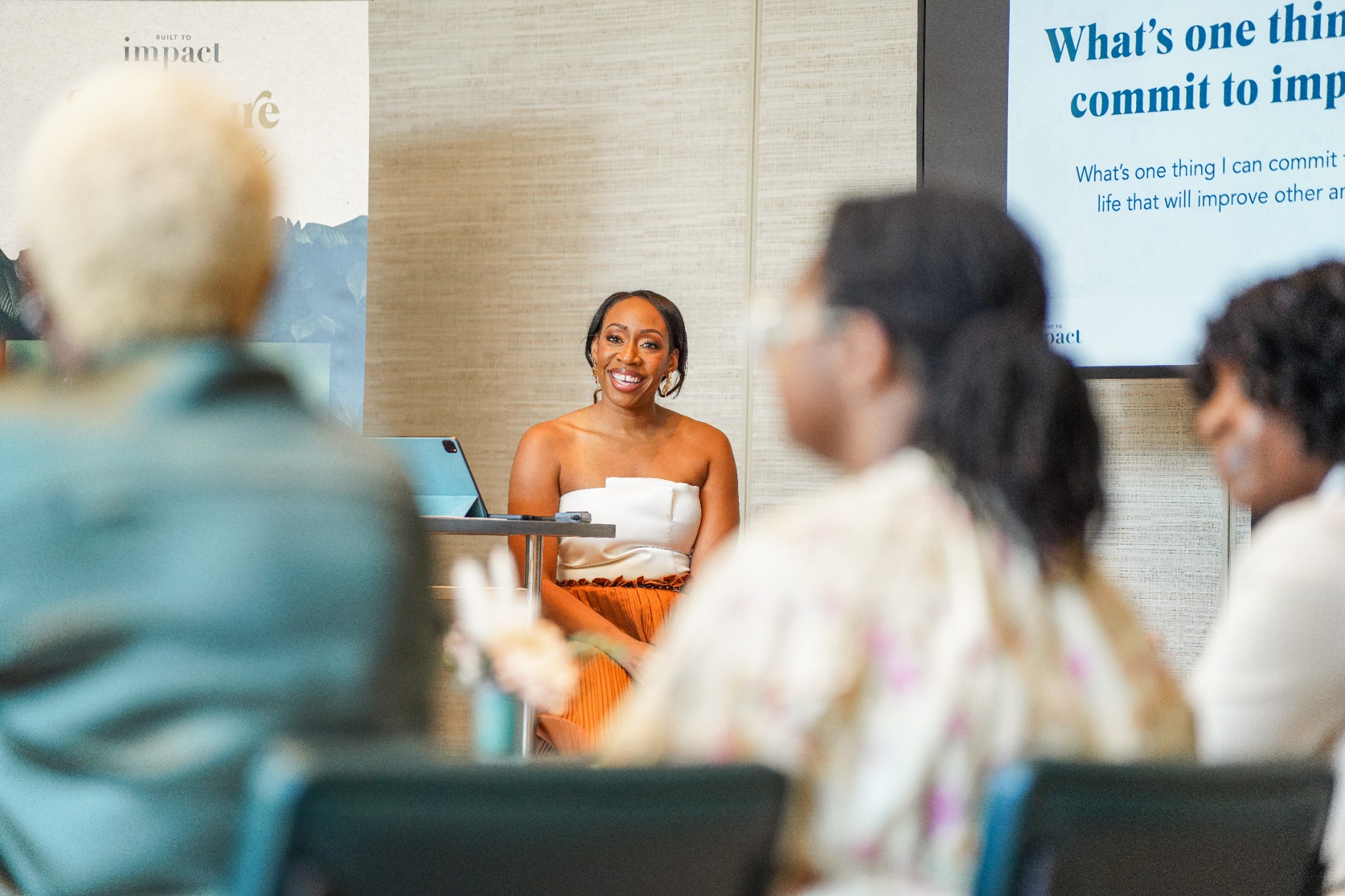 Maya coaching entrepreneurs at a past retreat