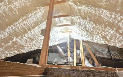 Open cell spray foam insulation sealing attic for energy savings in Springtown Texas