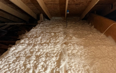 Open cell spray foam insulation in attic reducing noise for quieter Texas homes