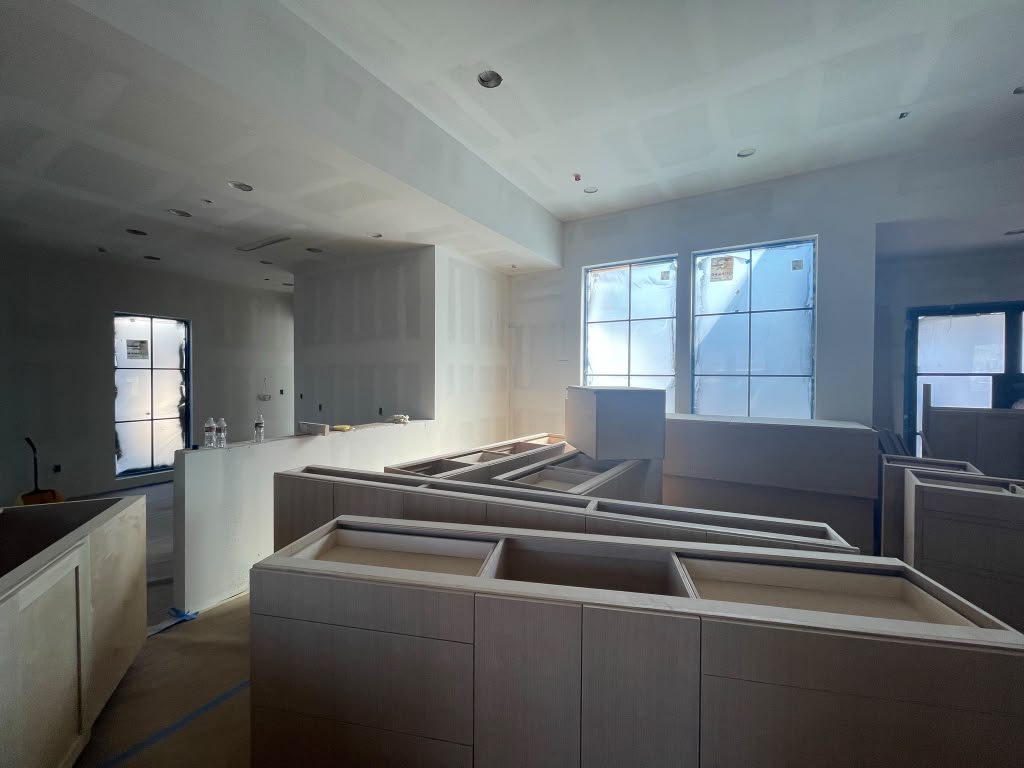 Interior space with marked and faded walls before painting