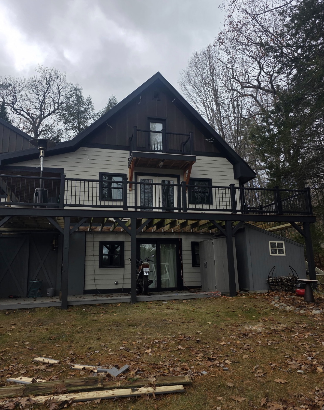 Renovated lakeside home exterior with an expanded deck