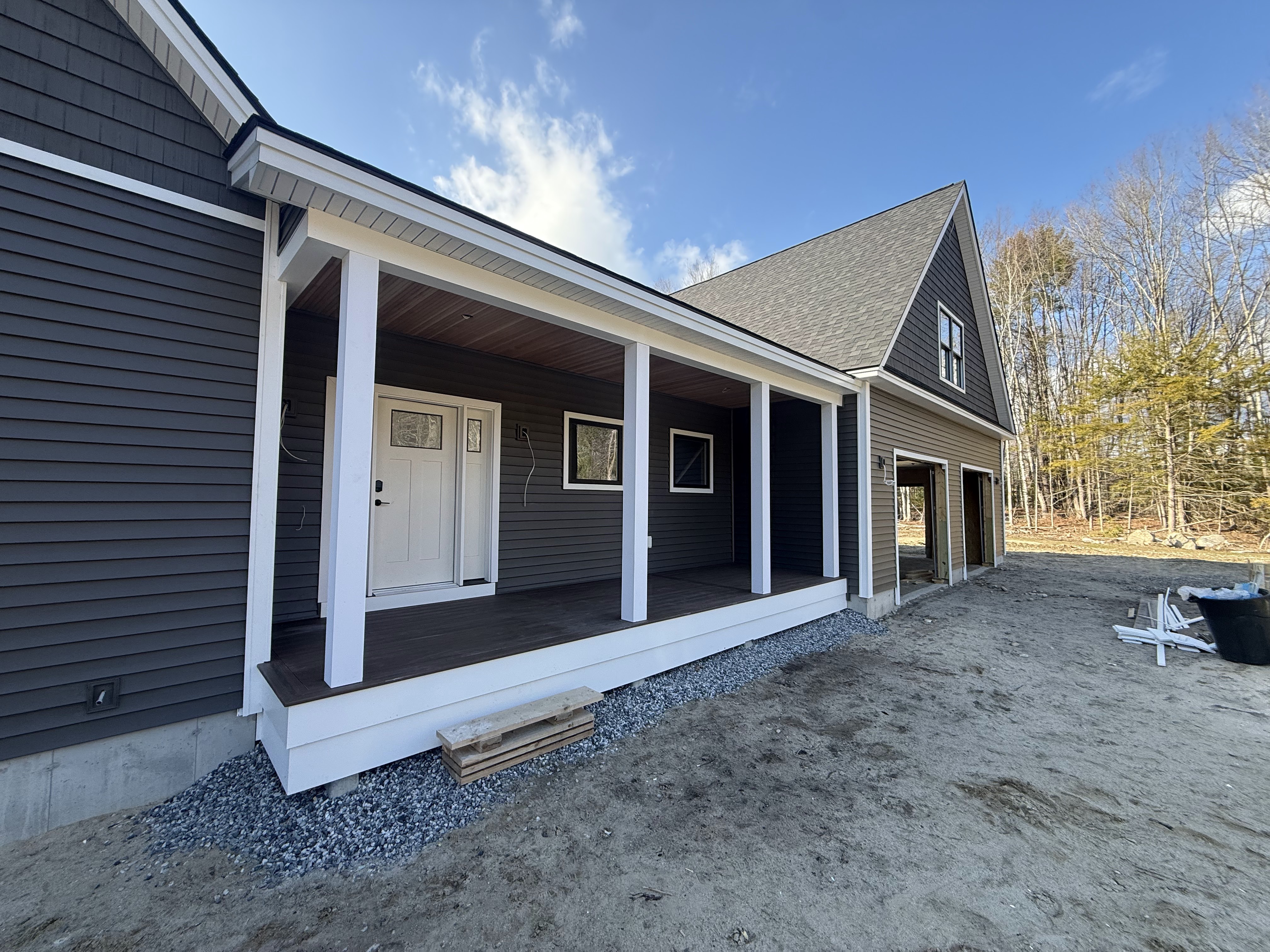 Custom home exterior under construction