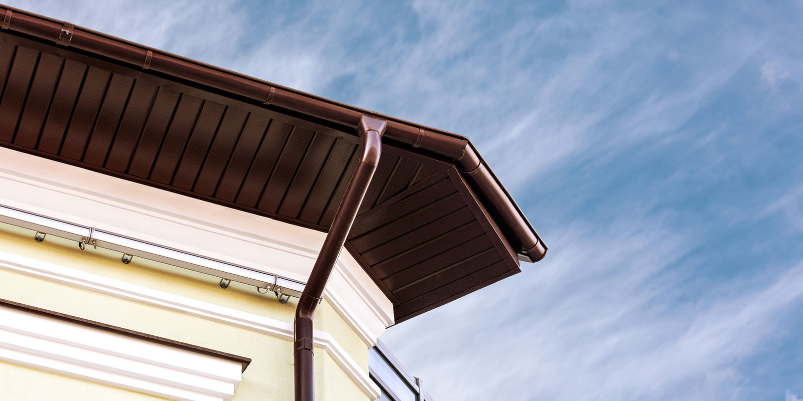 Copper gutters installed for long life and premium curb appeal.