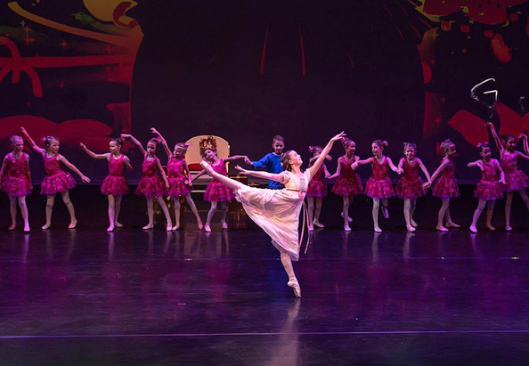 Young dancers performing in the annual Nutcracker production on stage