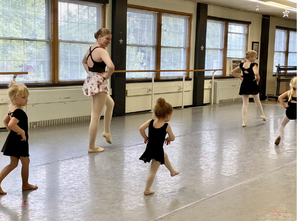 A young dancer at her first ballet class
