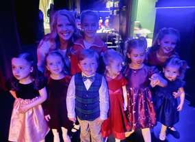 Dancers preparing backstage together