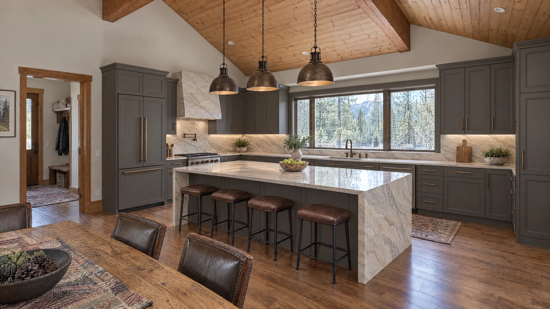 Design inspiration: Graphite cabinetry and flowing pale quartzite create a composed kitchen beneath an existing vaulted roof.