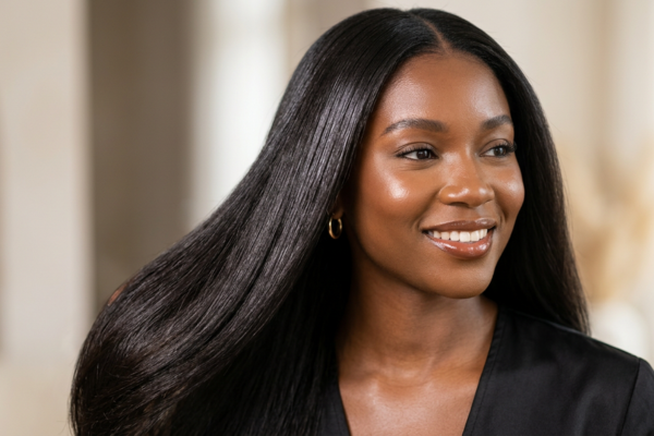 Close-up of healthy moisturized hair with soft shine and smooth texture Close-up of healthy moisturized hair with soft shine and smooth texture