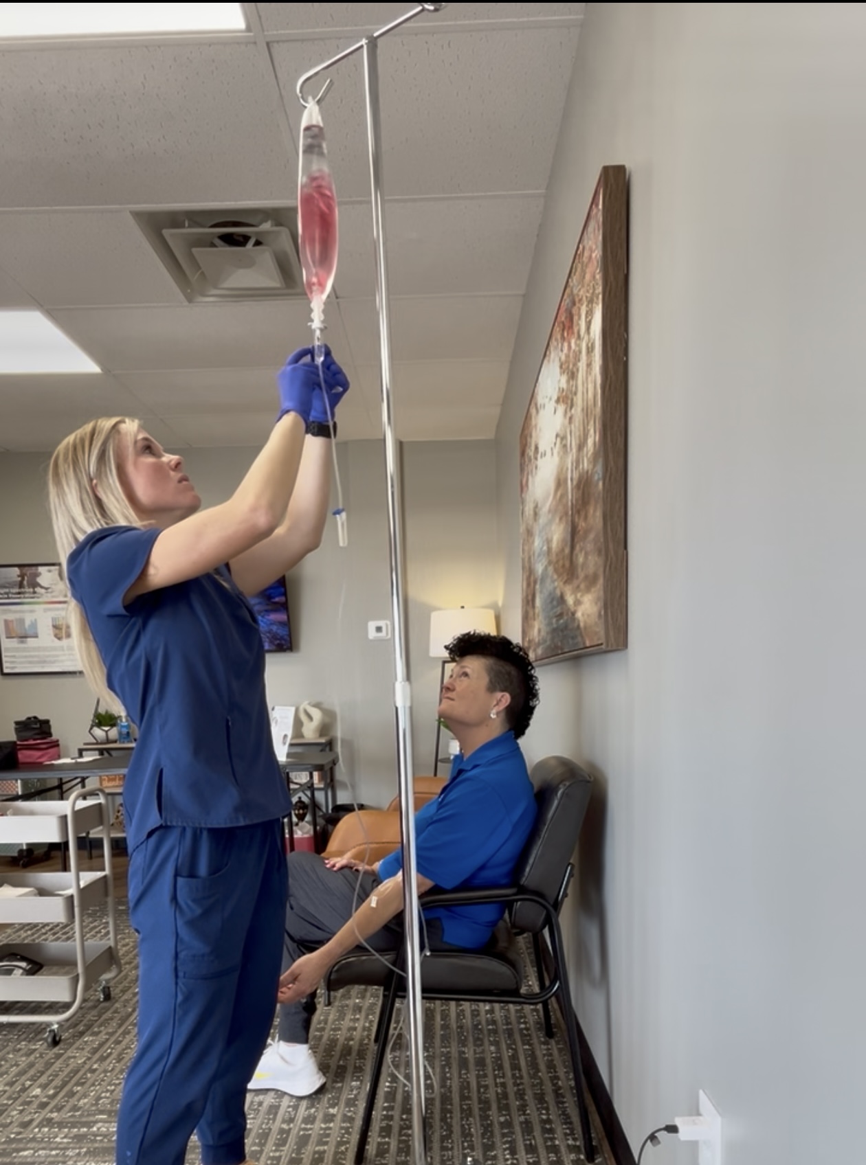 Nurse Tiffyy performing IV therapy
