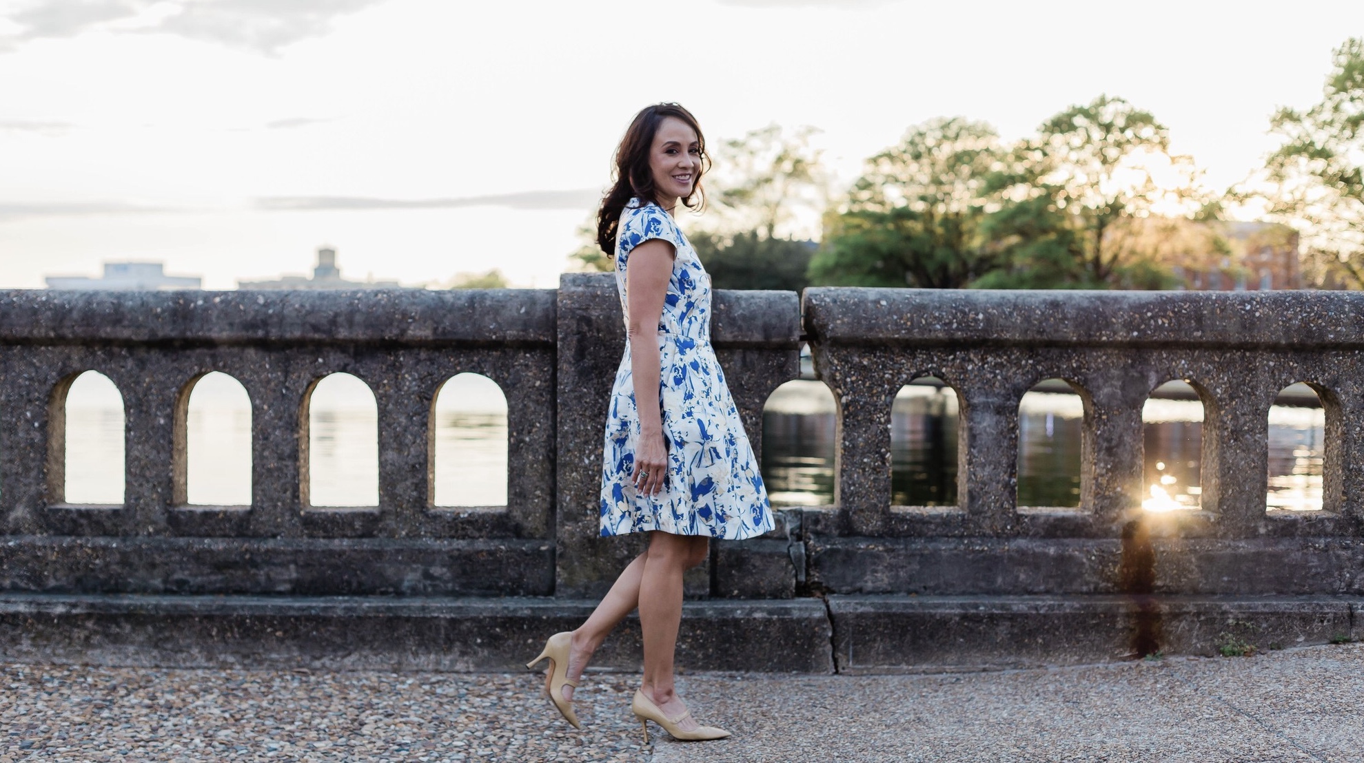 Leahmarie in a blue and white floral dress
