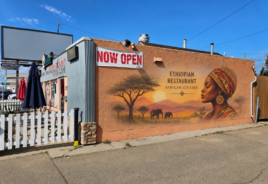 Colourful mural on an Ethiopian restaurant exterior wall