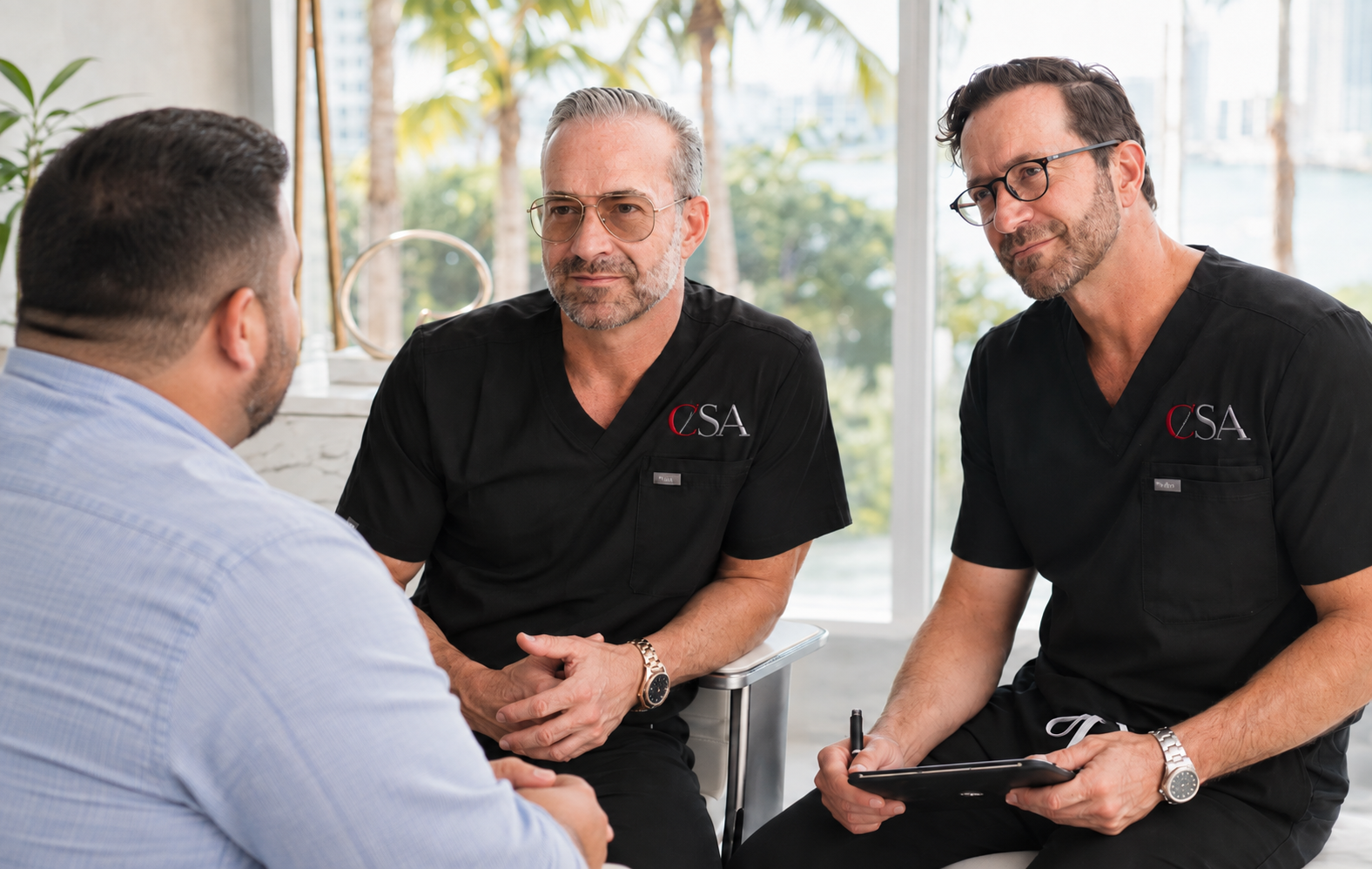 Patient consultation with Miami surgical team