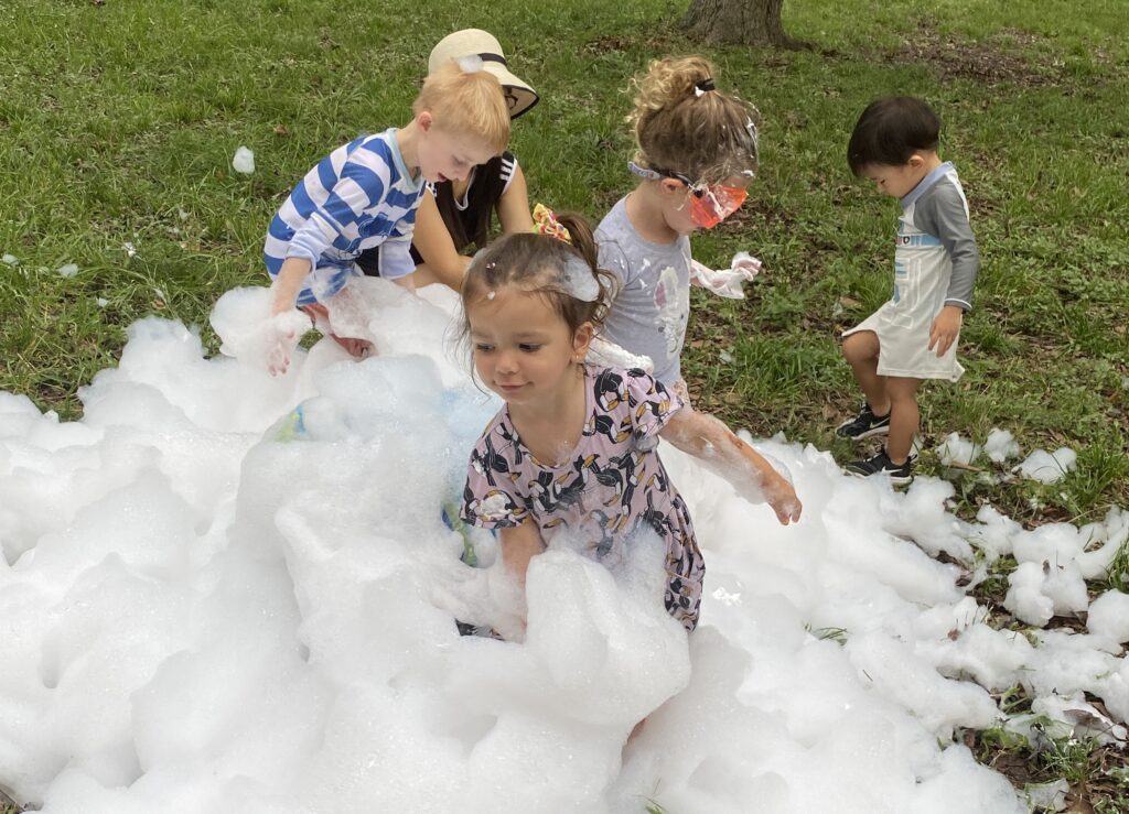 Child learning outdoors in a natural classroom setting