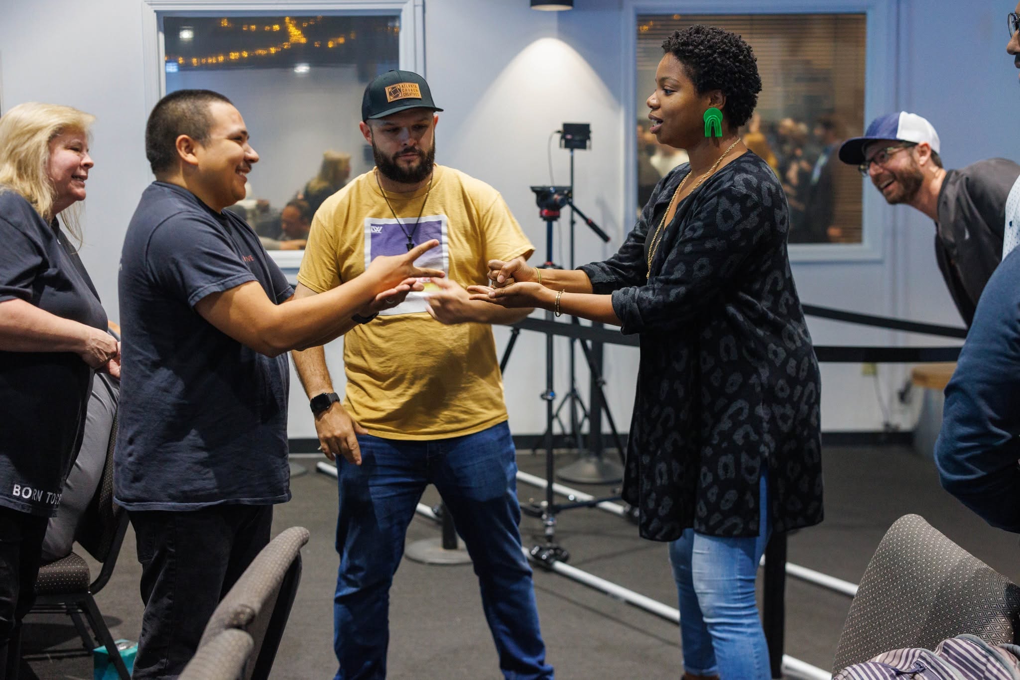 Creative professionals reviewing a production setup