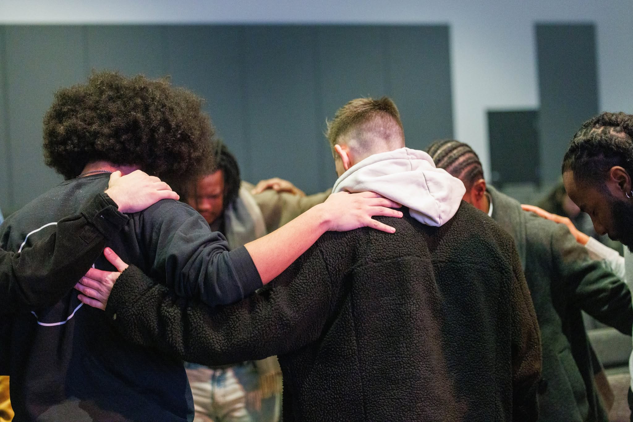 Church creatives encouraging one another at a community gathering