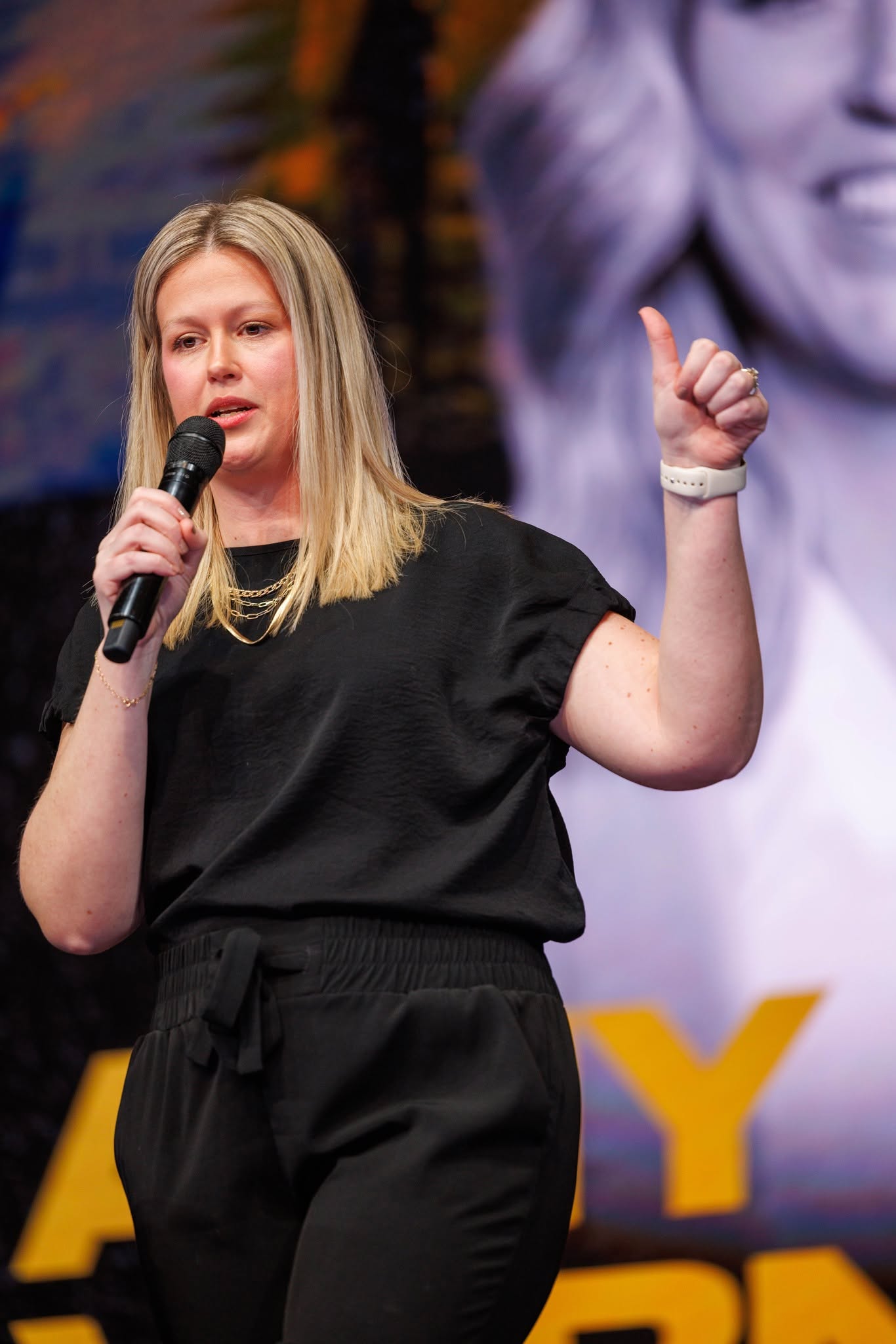 A church creative receiving encouragement from the stage