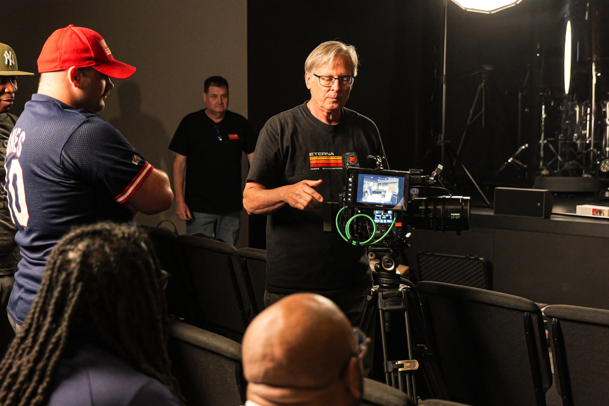 An instructor leading a camera lab with attendees